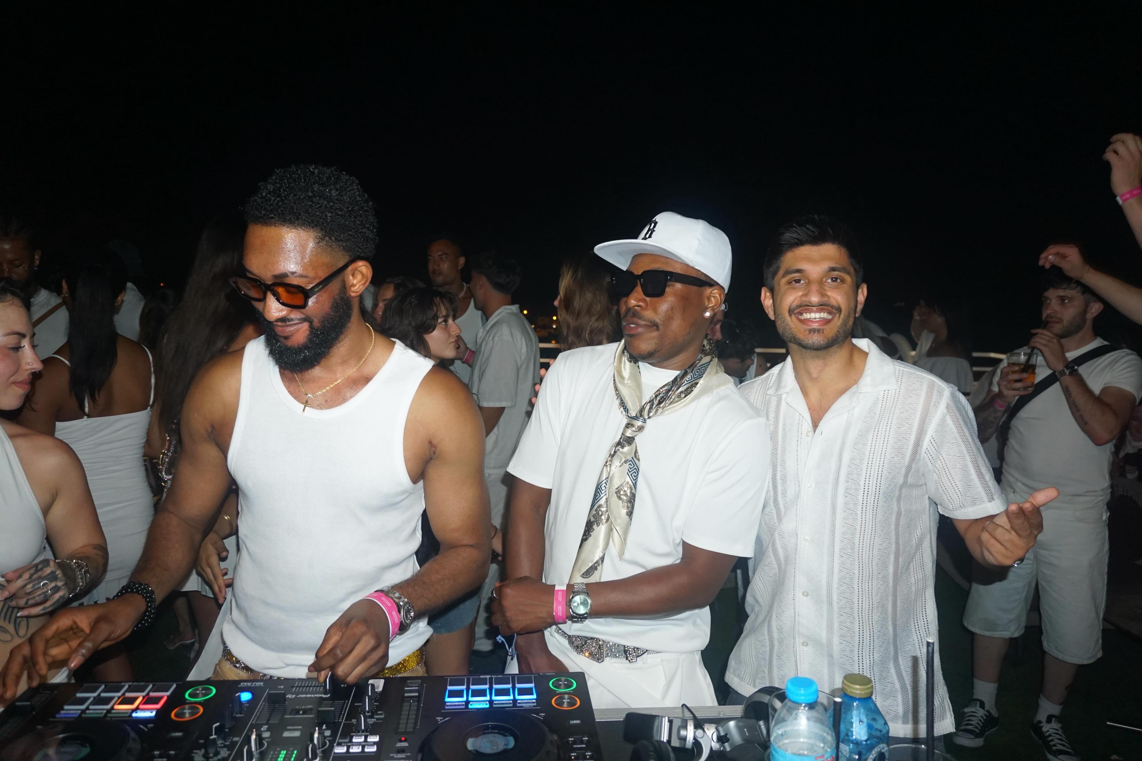 DJ Booth Performance with Crowd